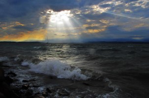 sun-shining-through-clouds-on-the-water1
